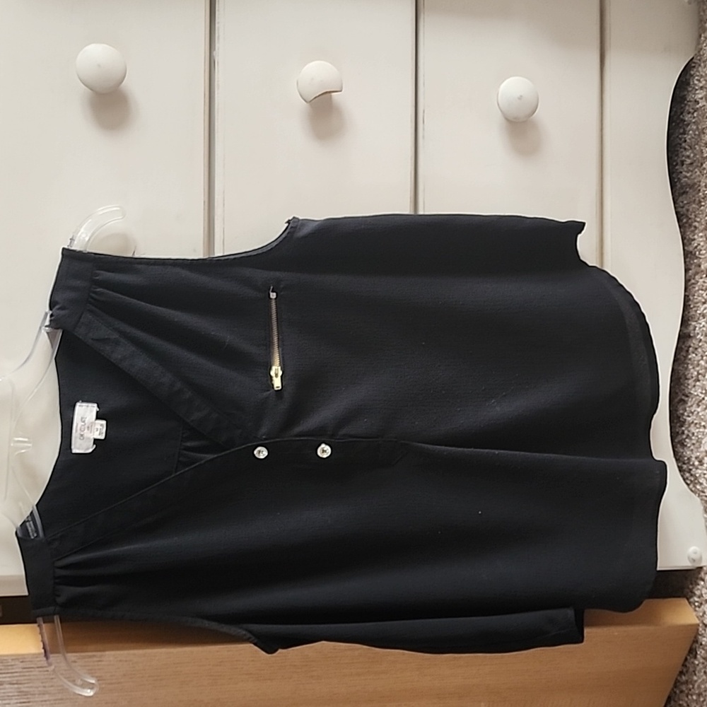 Black top with gold buttons and zipper